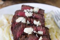 Steak Topped with Blue Cheese and Caramelized Onions