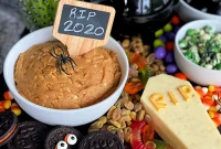 Sweet and Savory Halloween Snack Board with Peanut Butter Dip