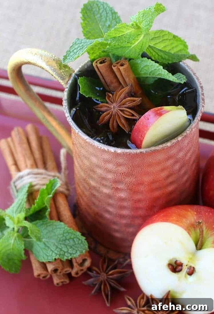 The garnishes in this Apple Cider Mojito are what makes this drink!