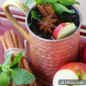 The garnishes in this Apple Cider Mojito are what makes this drink!