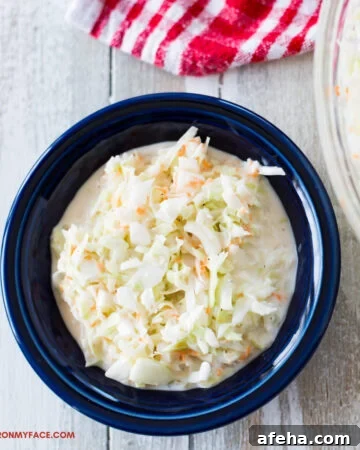 a small serving bowl of homemade sweet coleslaw