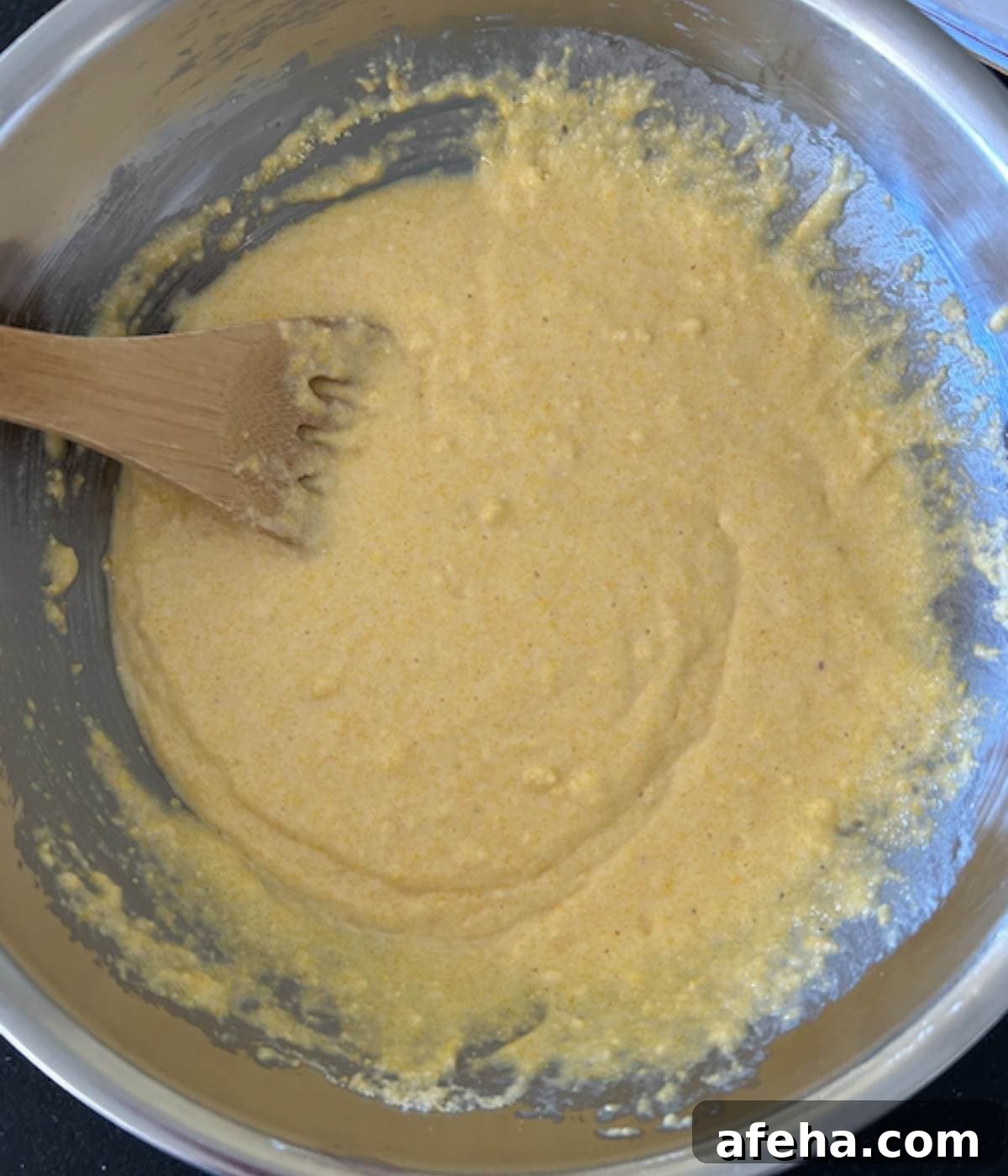 Cornbread mixture in bowl.