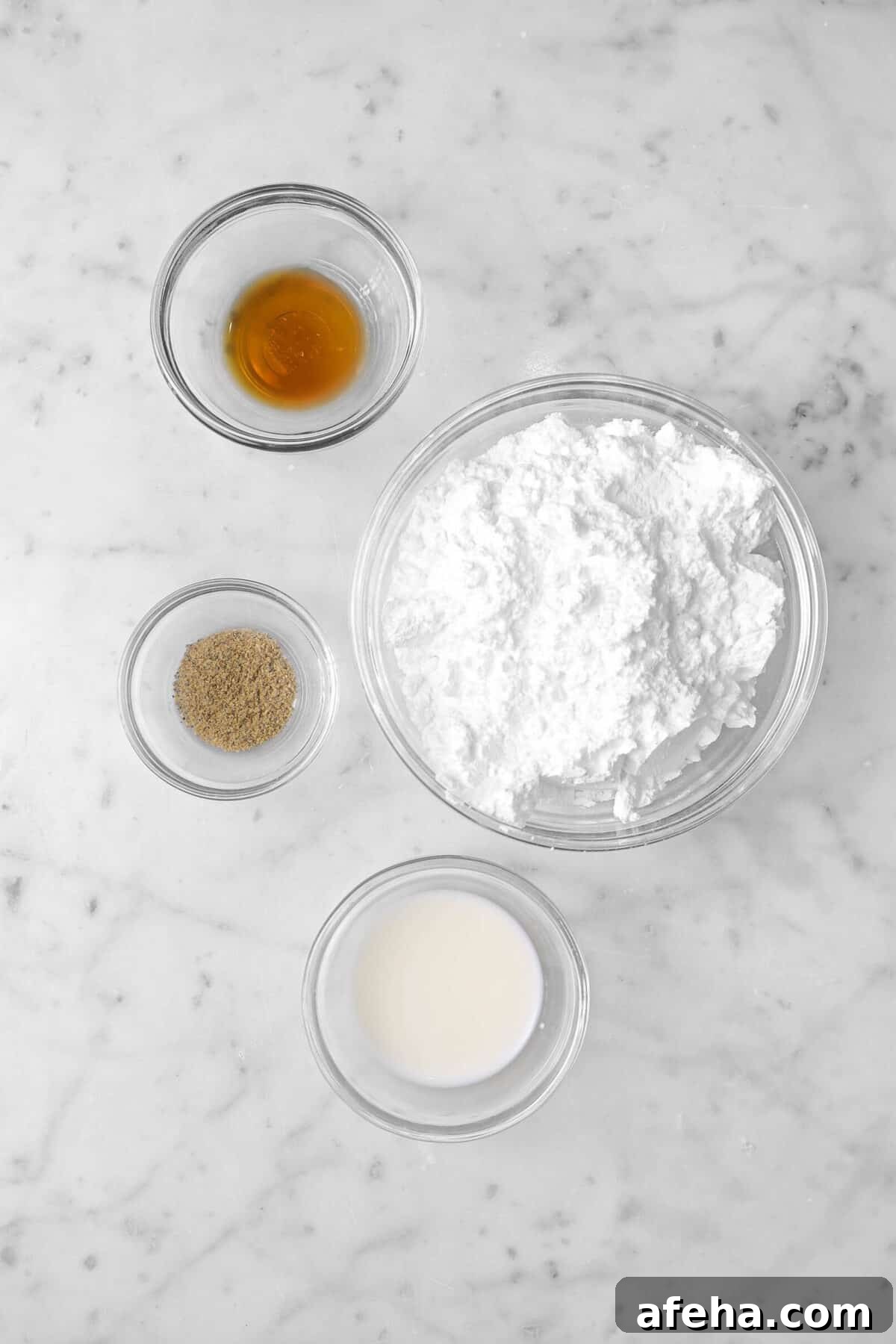 powdered sugar, vanilla, ground cardamom, and milk in glass bowls