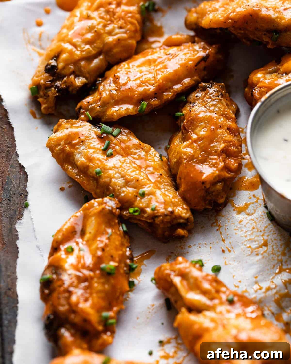 closeup shot of cooked frozen chicken wings in air fryer