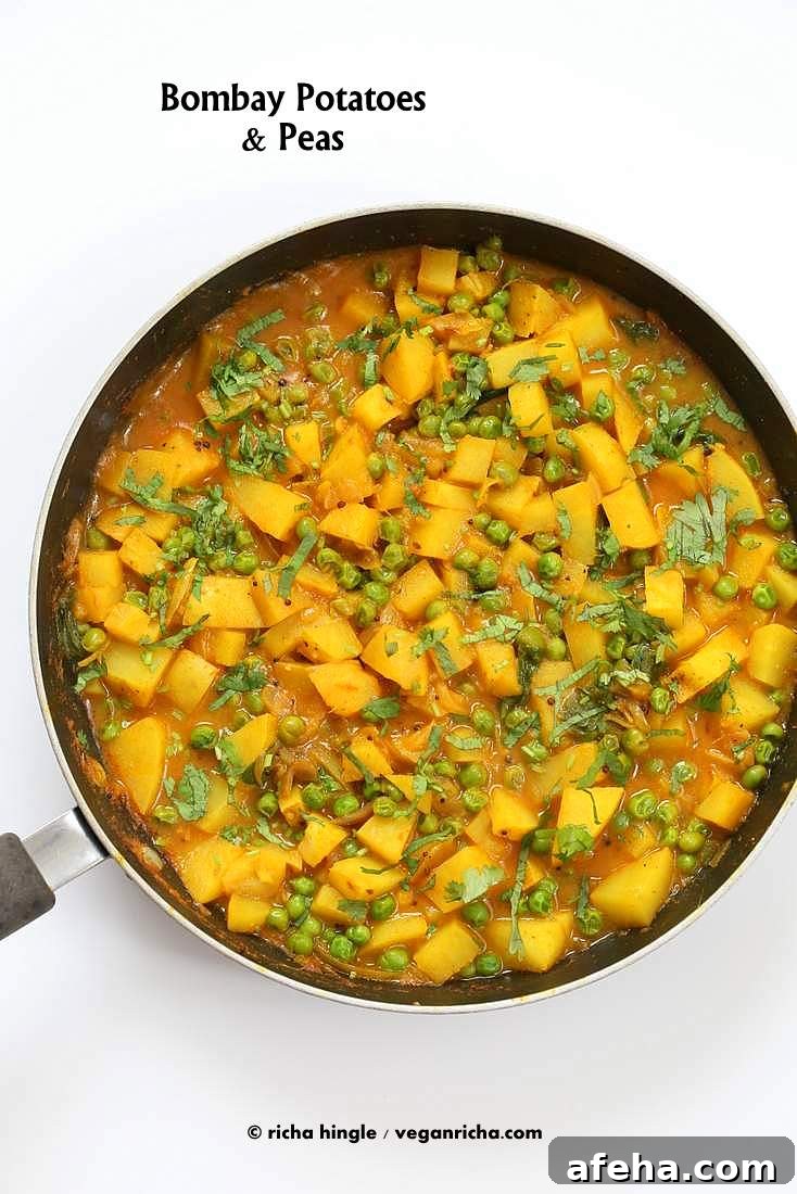 Vegan Bombay Potatoes and Peas | https://veganricha.com Easy Indian Spiced Potato and Pea curry. #vegan #glutenfree #soyfree #Indian