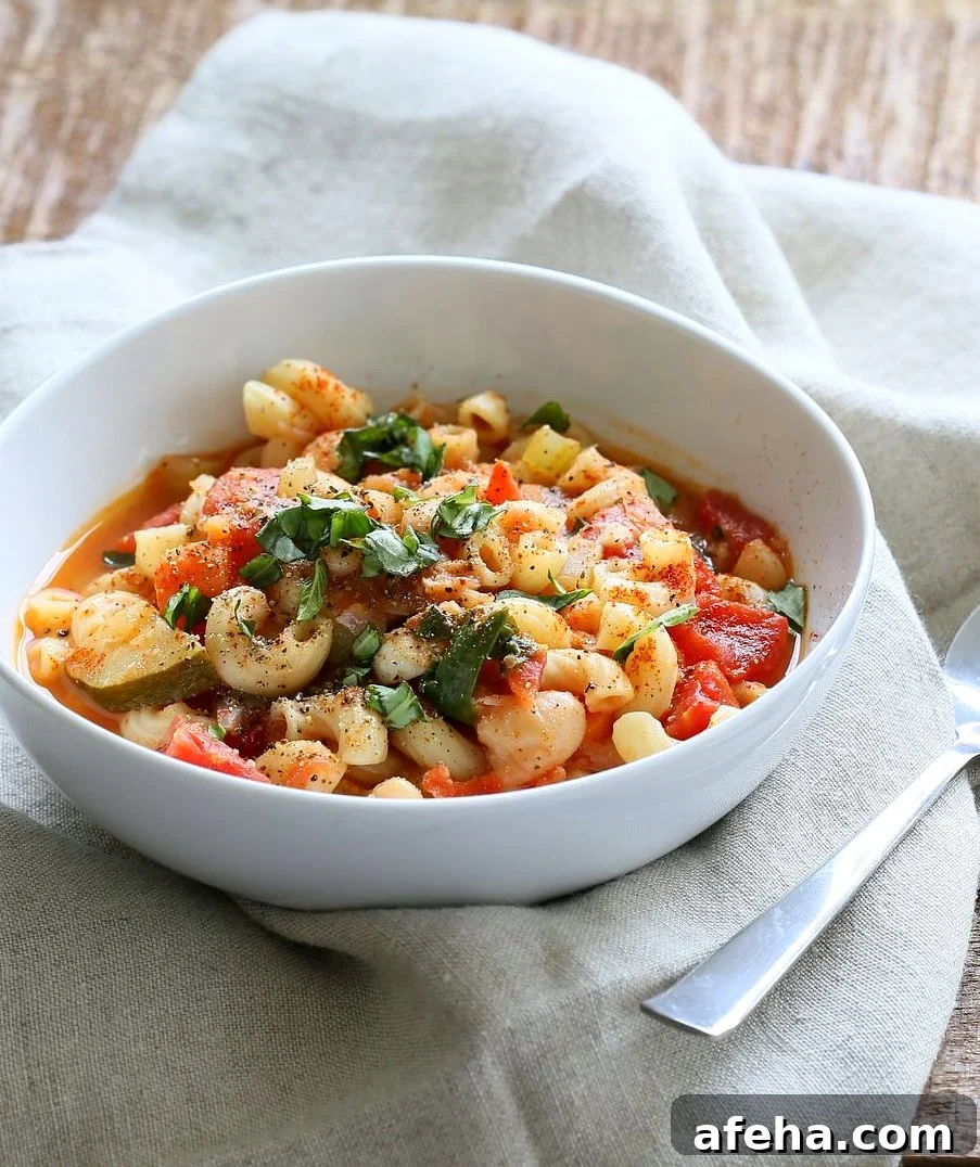 Vegan Minestrone - White Bean Soup with Elbows, Veggies, Basil and vegan parmesan. Can be gluten-free, nut-free. Soy-free Vegan Dairy-free Recipe | VeganRicha.com