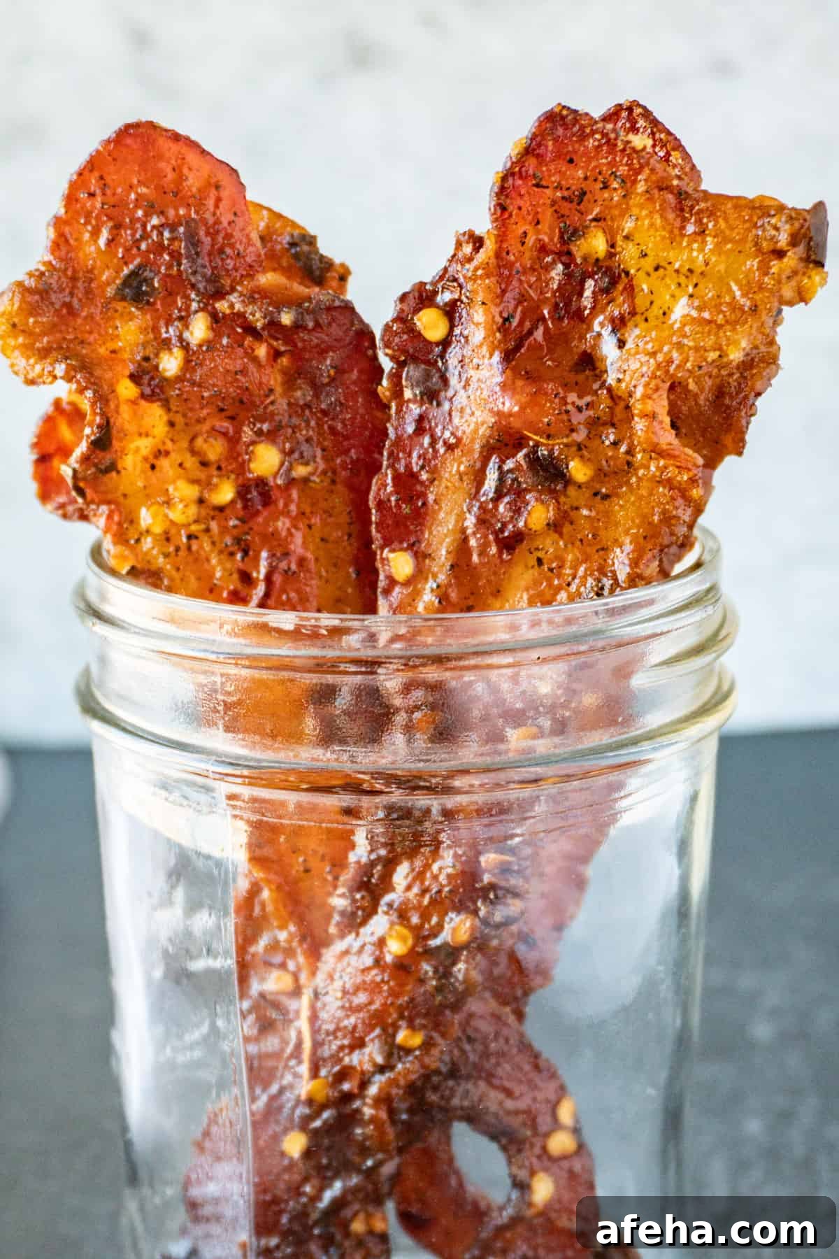 brown sugared bacon in a jar