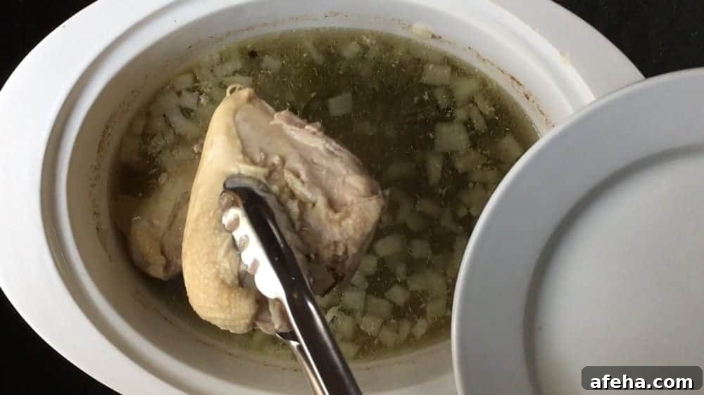 removing chicken breast from slow cooker