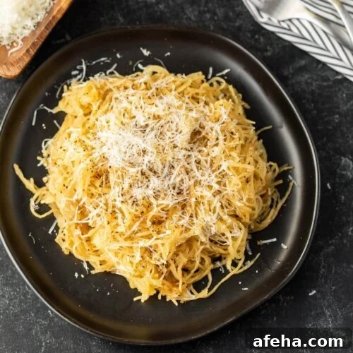 Spaghetti Squash cooked on a Blackstone Griddle topped with Parmesan.