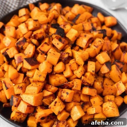 Diced grilled sweet potatoes on a plate