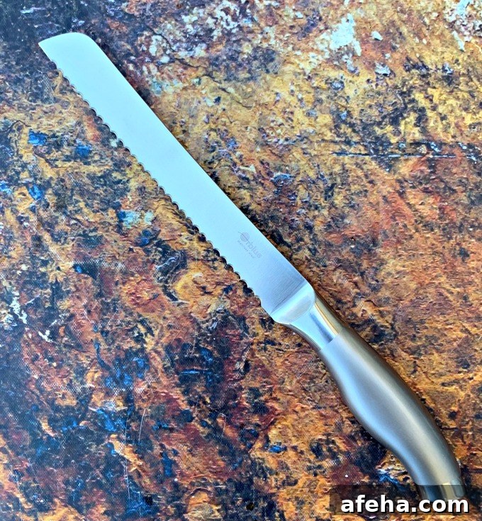 serrated bread knife on a flat surface