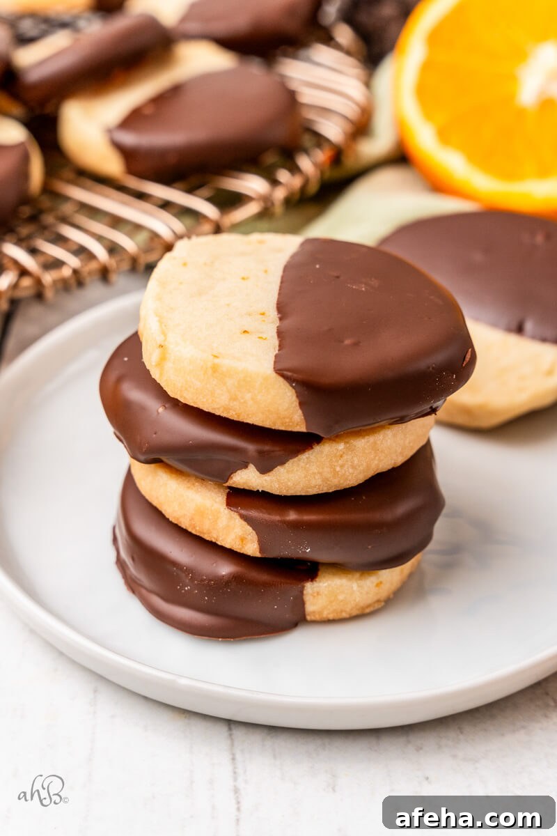 A stack of four chocolate Orange Shortbread Cookies.
