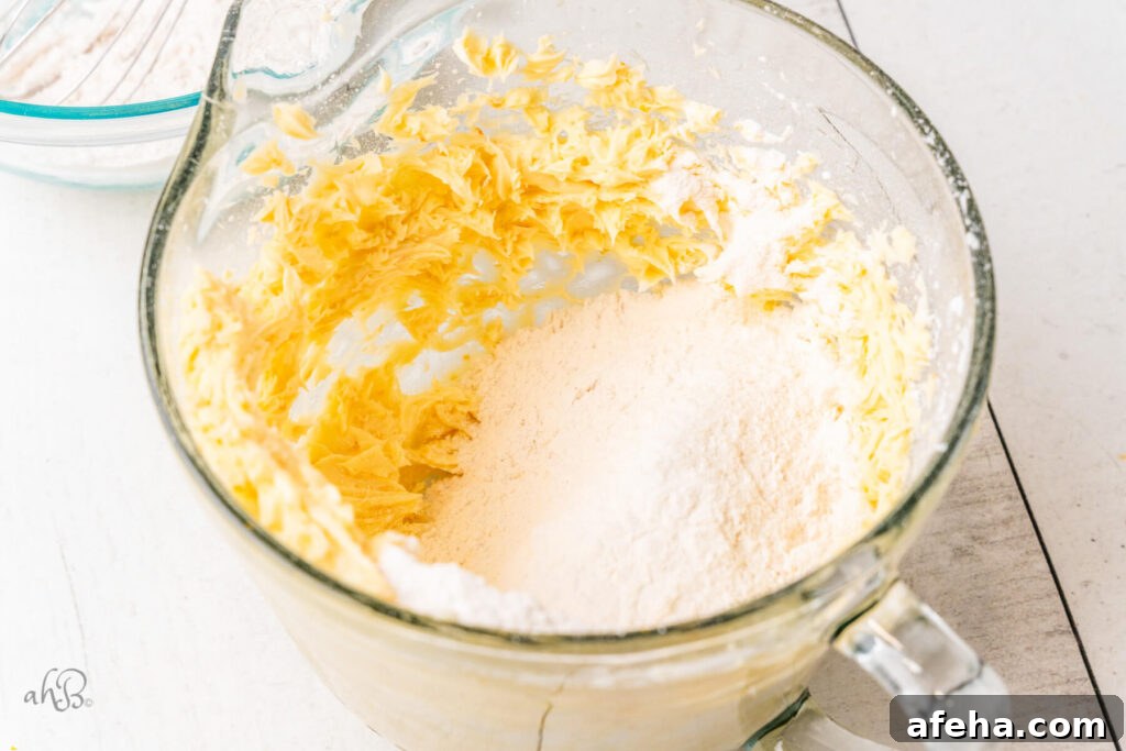 The flour is added to the glass bowl.