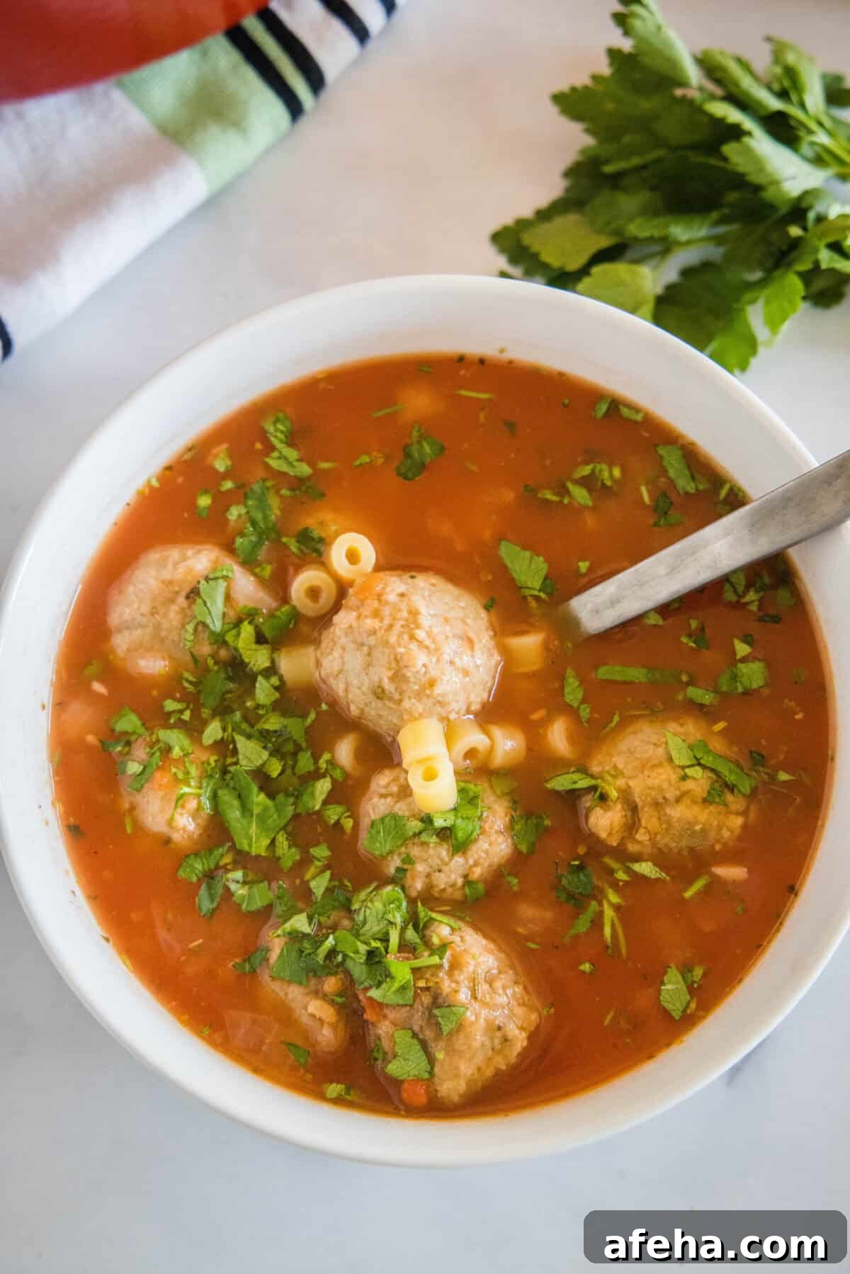 Hearty Italian Meatball Soup Recipe with Tender Meatballs 6 looking down on bowl of italian meatball soup