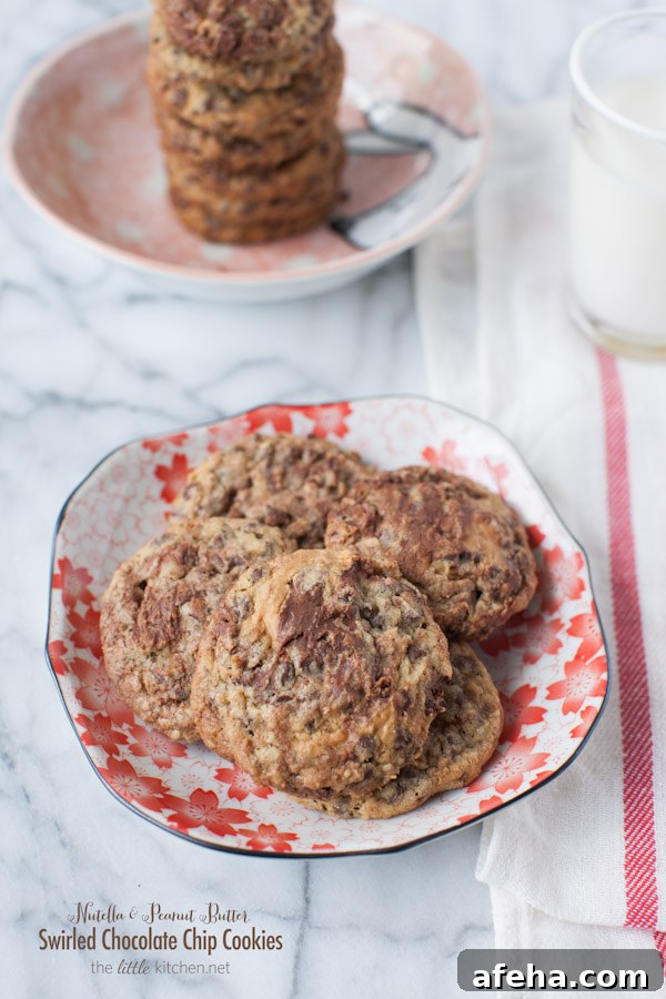 Nutella and Peanut Butter Swirled Chocolate Chip Cookies from thelittlekitchen.net