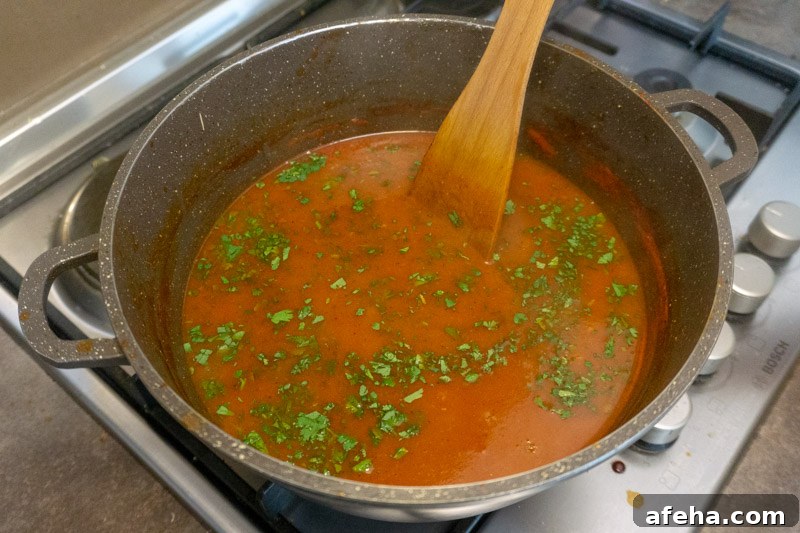 Spicy Satsebeli: Authentic Georgian Tomato Sauce Recipe 5 Adding cilantro to your sauce