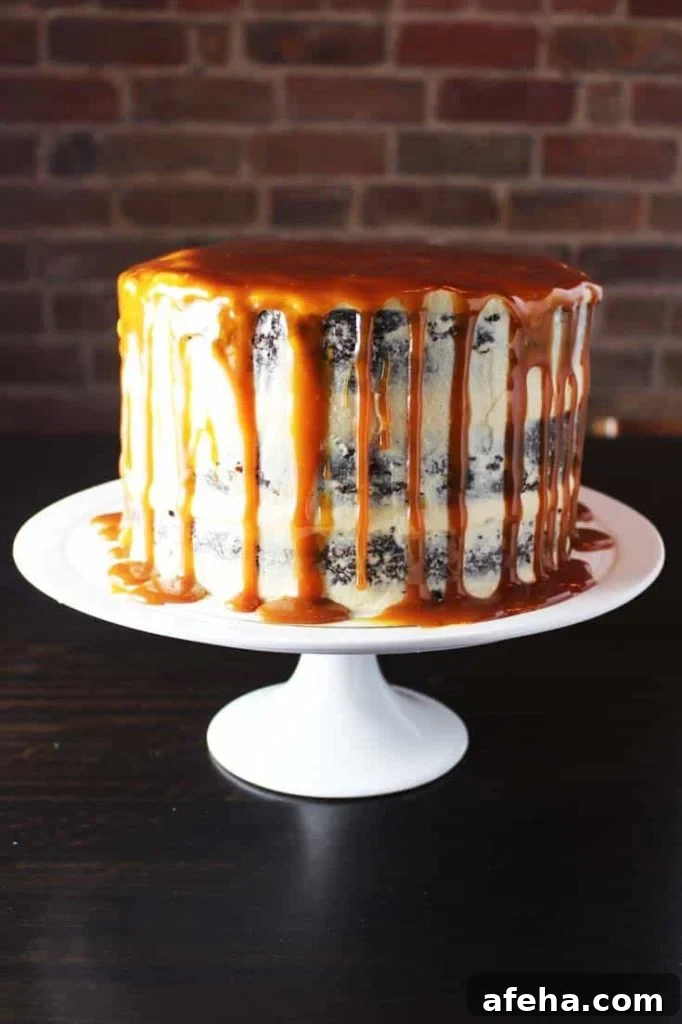 Caramel chocolate cake on a plate with coconut caramel frosting and caramel drizzle 