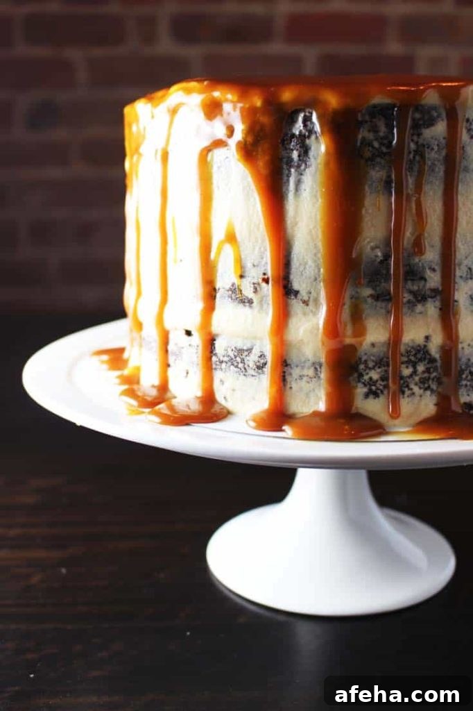 Closeup of caramel chocolate cake on a plate with coconut caramel frosting and caramel drizzle 