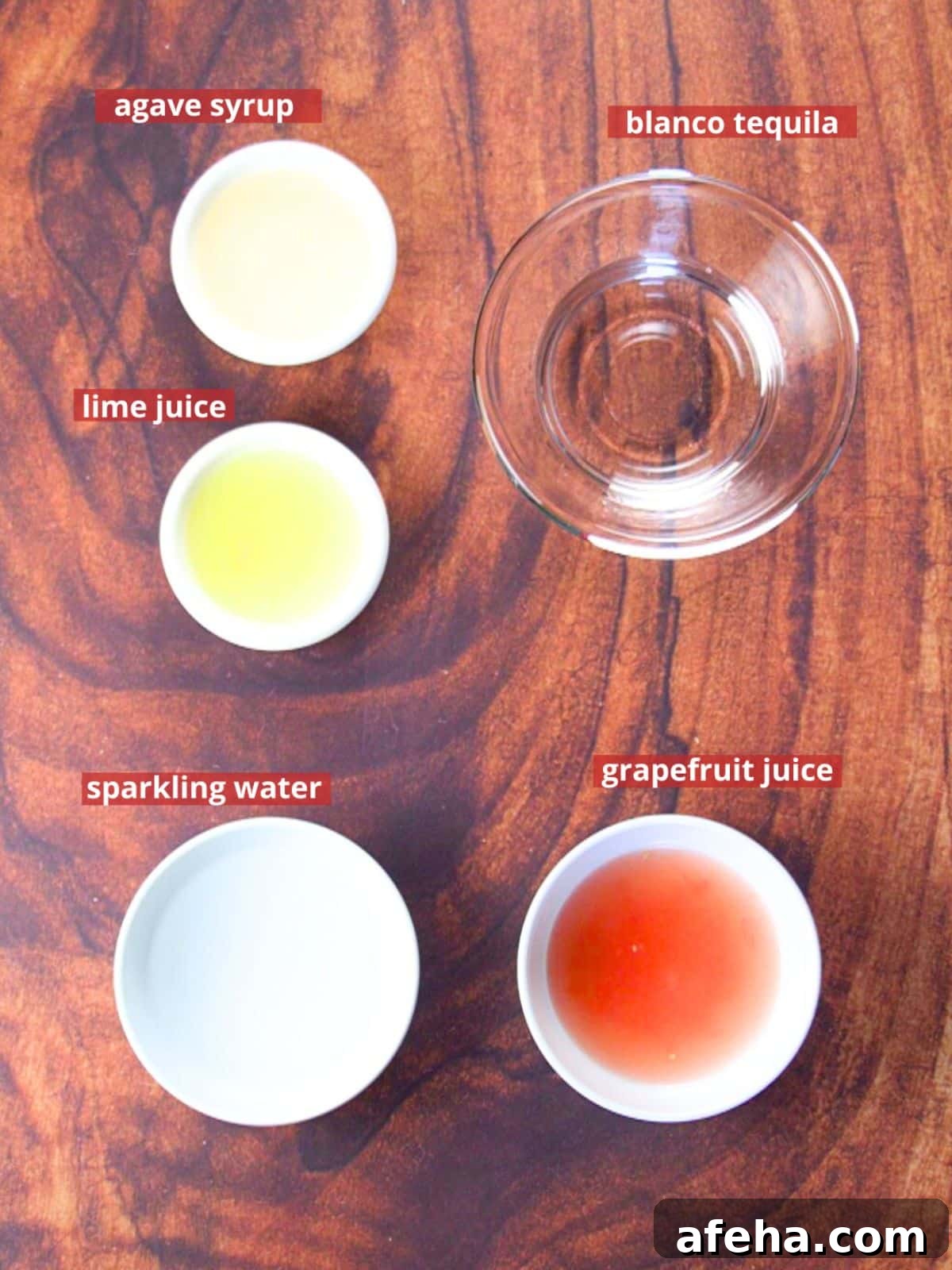 Paloma recipe ingredients: sparkling water, grapefruit juice, salt, lime juice, agave syrup, and blanco tequila. Hostess At Heart
