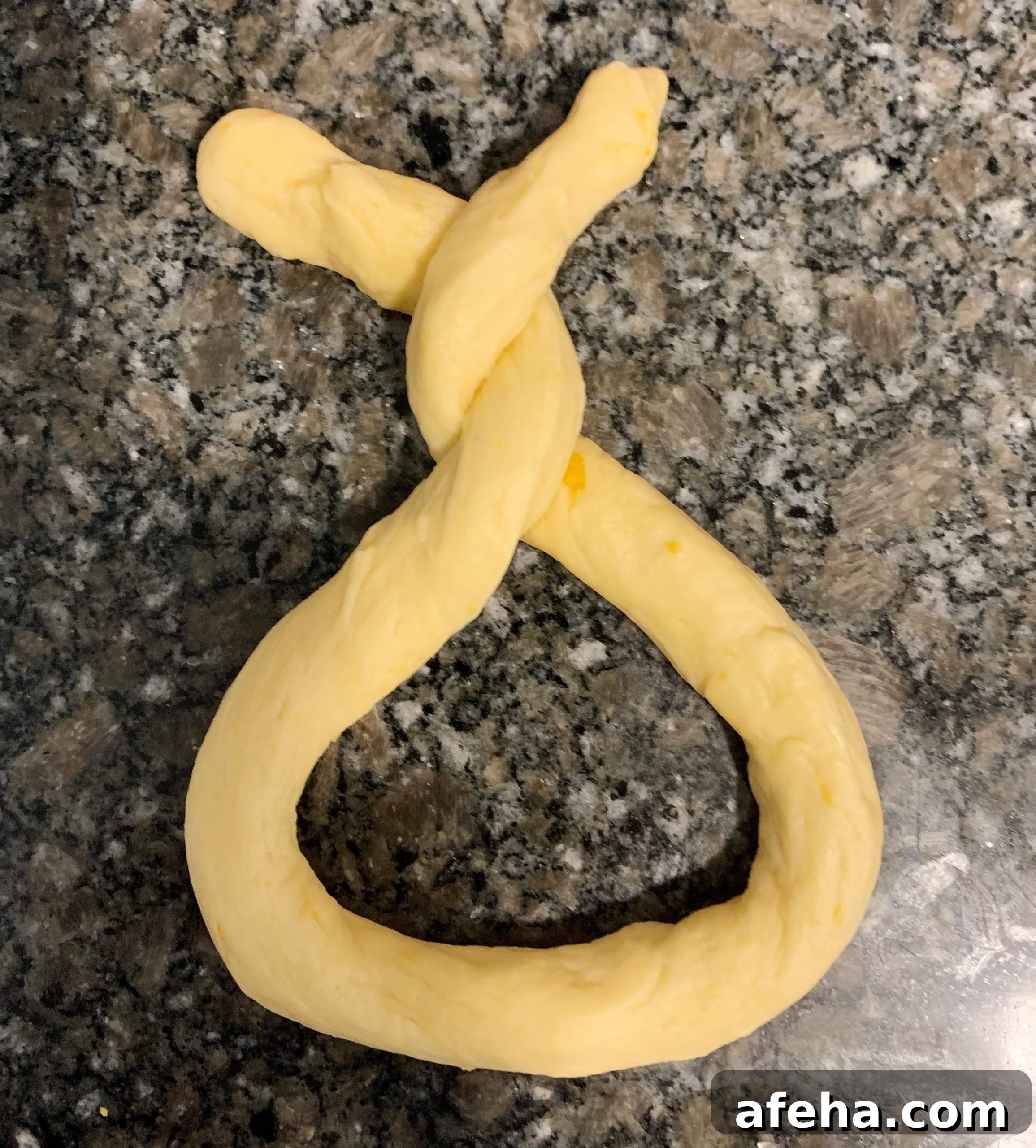 Cheesy Garlic Soft Pretzels Recipe for Melty, Savory Bites 9 Soft and chewy homemade pretzels with orange cheddar and garlic