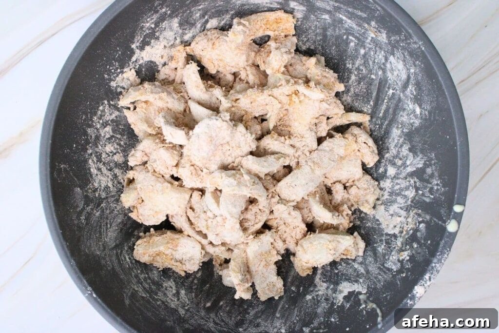 mix coated onions into the flour mixture to coat