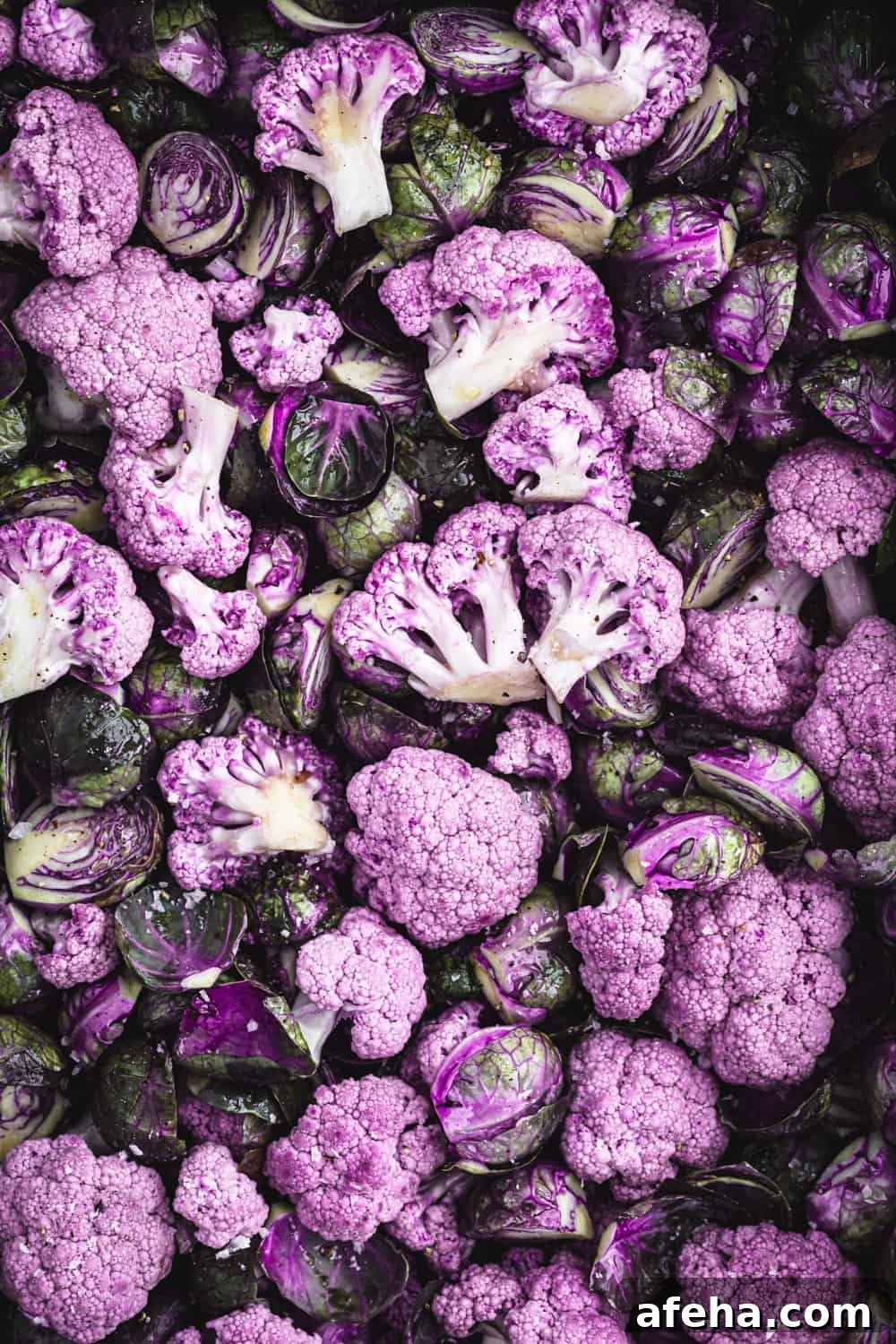 Purple Cauliflower Varieties: Flavor, Nutrition & Cooking Tips 5 purple cauliflower florets and purple Brussel sprouts