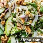 Super close up macro shot of healthy apple walnut salad.