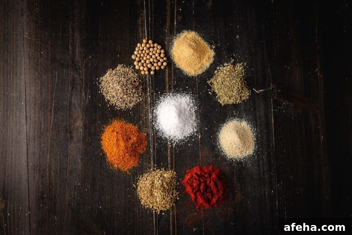 A small pile of salt on a tabletop, surrounded by a circle of 8 more piles of various spices.