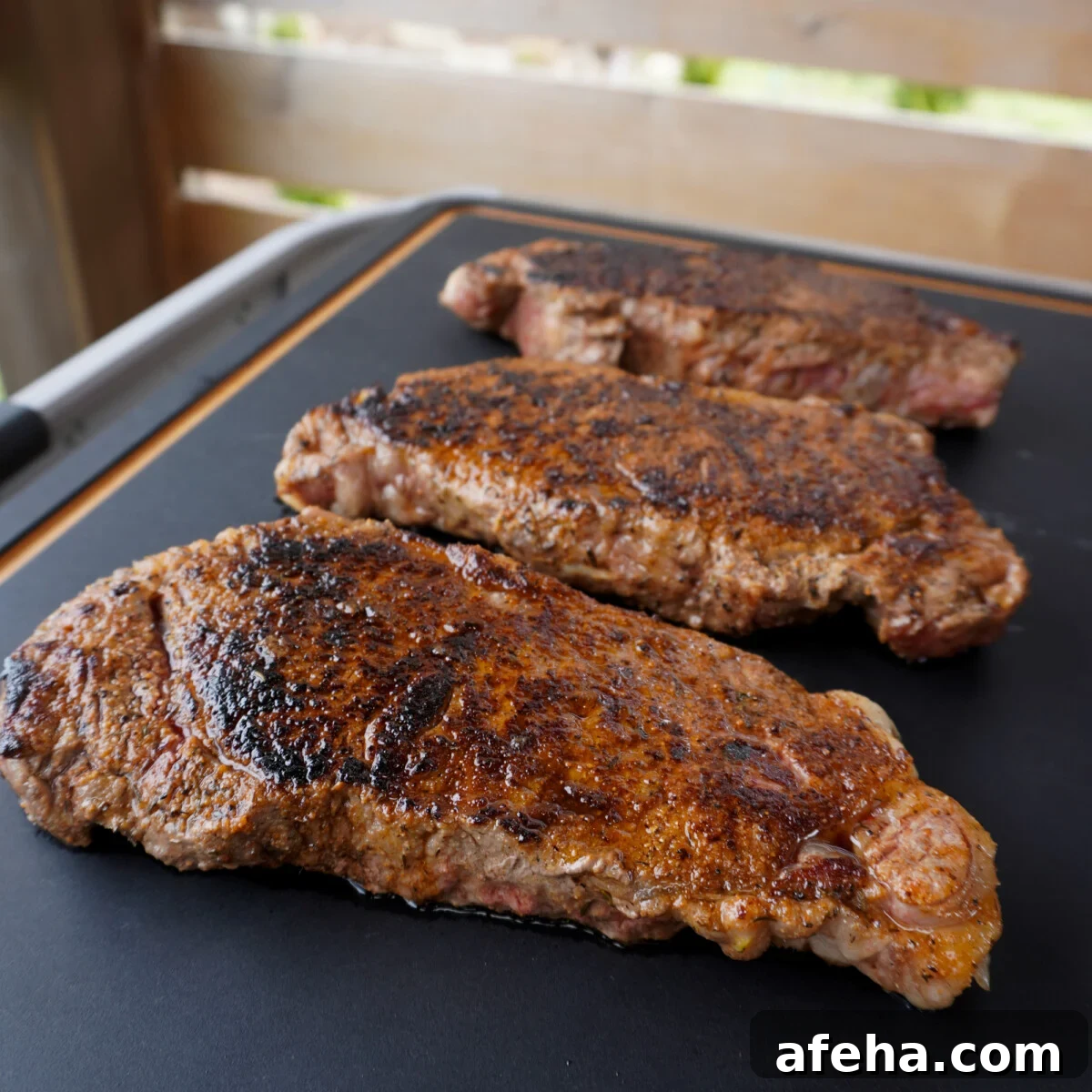 Grilled steaks resting.