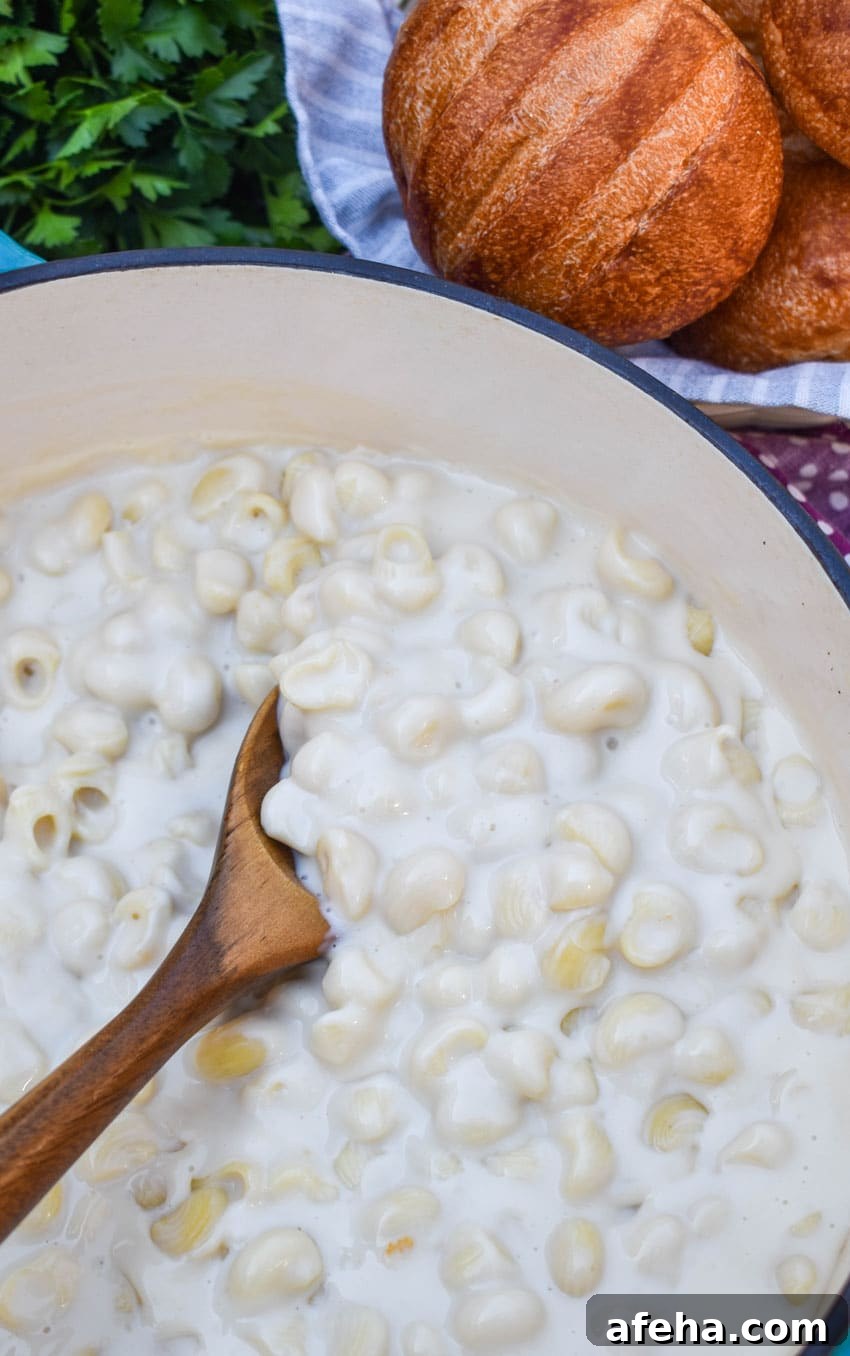 Panera Mac and Cheese Copycat Recipe: Creamy, Restaurant-Style 5 homemade panera bread mac and cheese in a red dutch oven