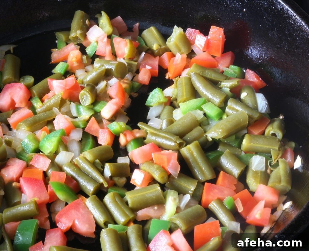 Sauté ingredients for huevos con ejotes (green bean scramble) #breakfast #huevosconejotes