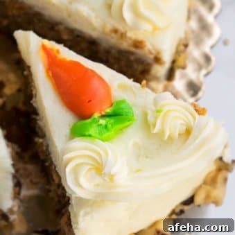 Slice of Easy Homemade Carrot Cake With Cream Cheese Frosting- Closeup Shot