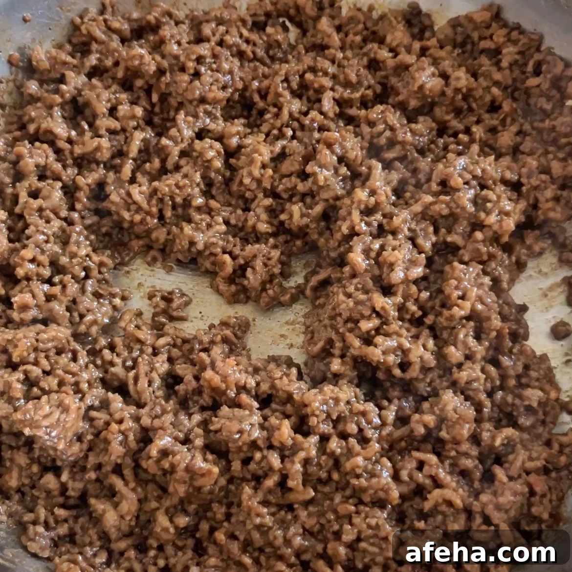 Mongolian Beef with Ground Beef: Quick Savory Stir-Fry Recipe 7 Mongolian Ground Beef cooked, seasoned, and browned perfectly in a skillet.