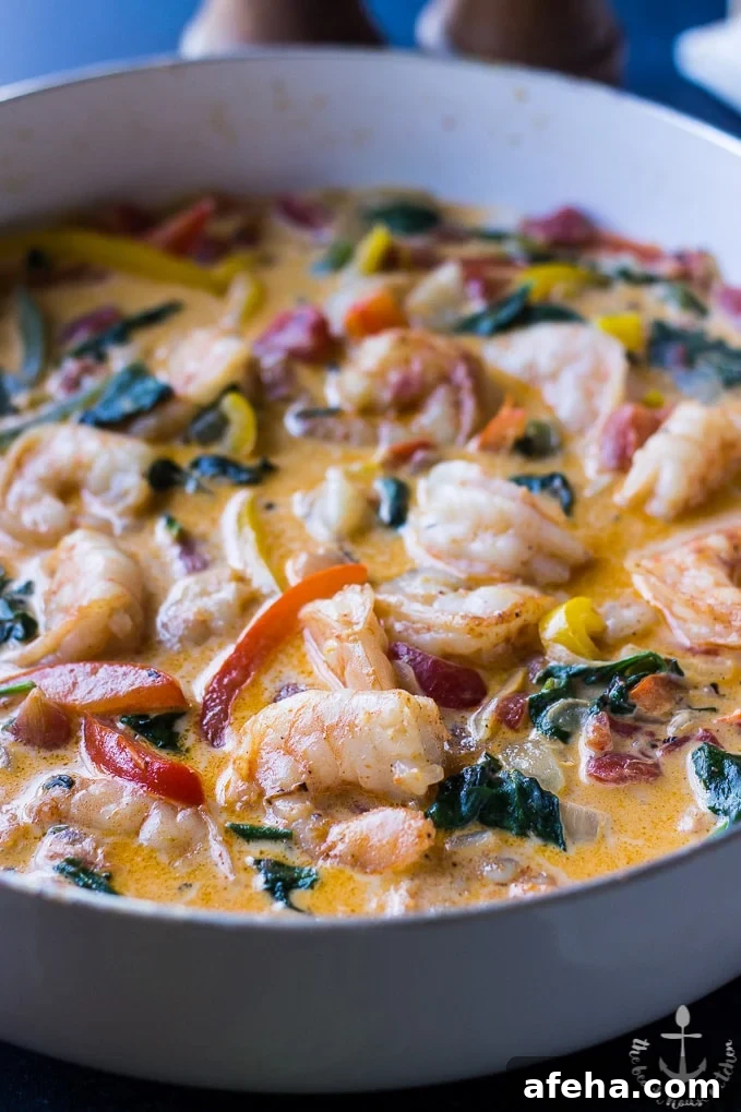 Cajun Shrimp Linguine in a white skillet.