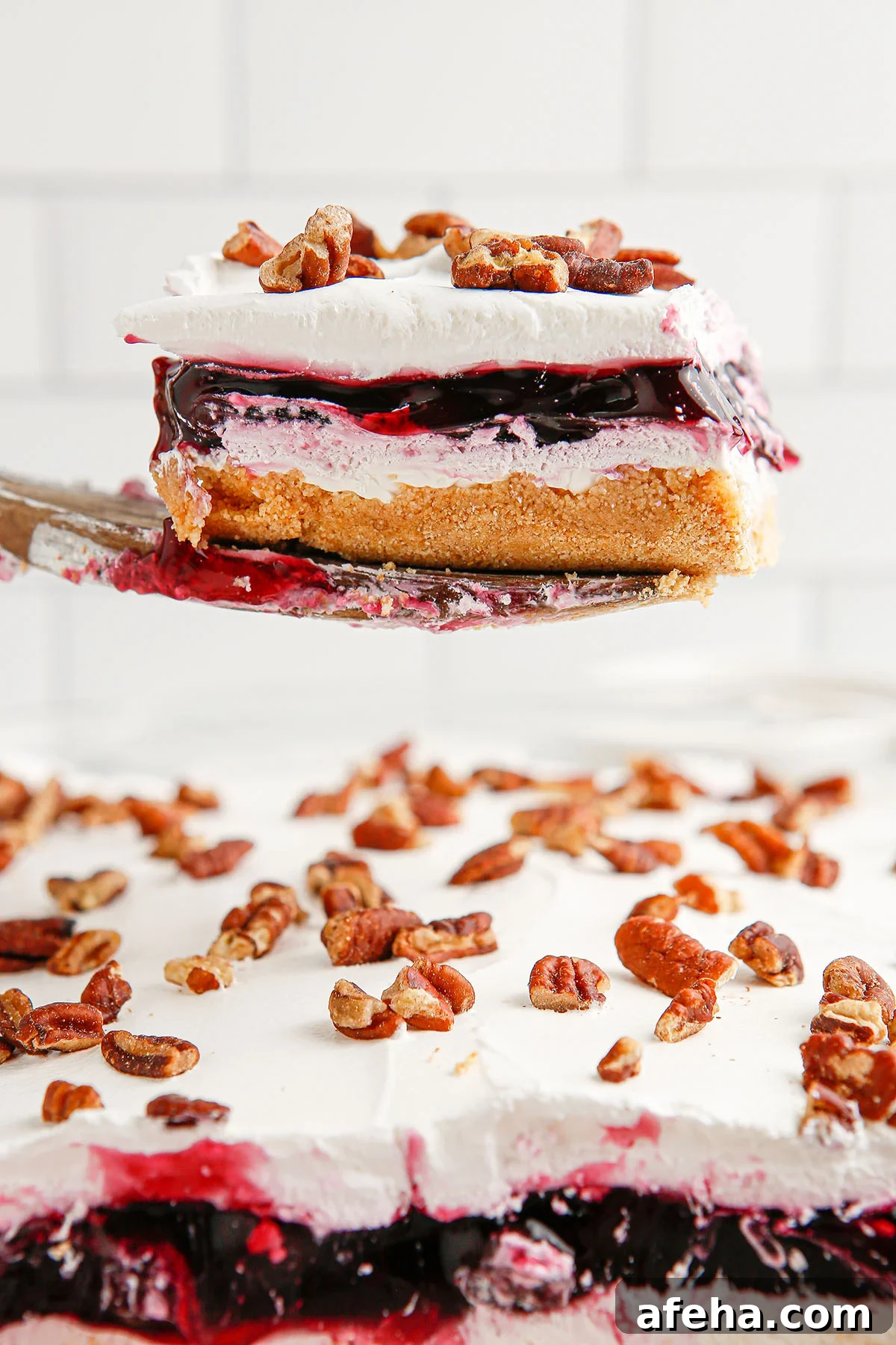 A slice of Blueberry Delight on a serving spoon.