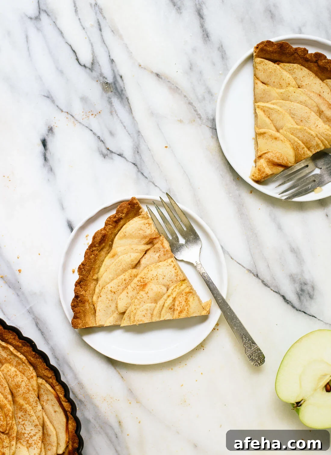 This delicious apple tart features an easy crust made with almond and oat flour. It's fool-proof! cookieandkate.com