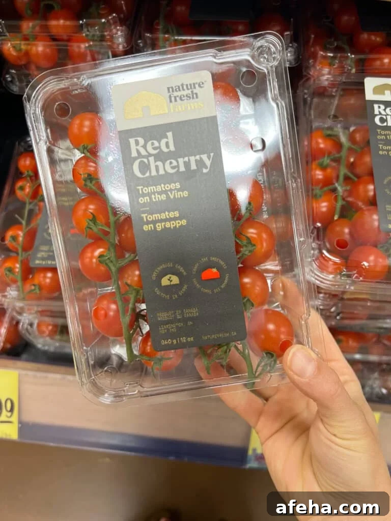 Carton of grape tomatoes on the vine