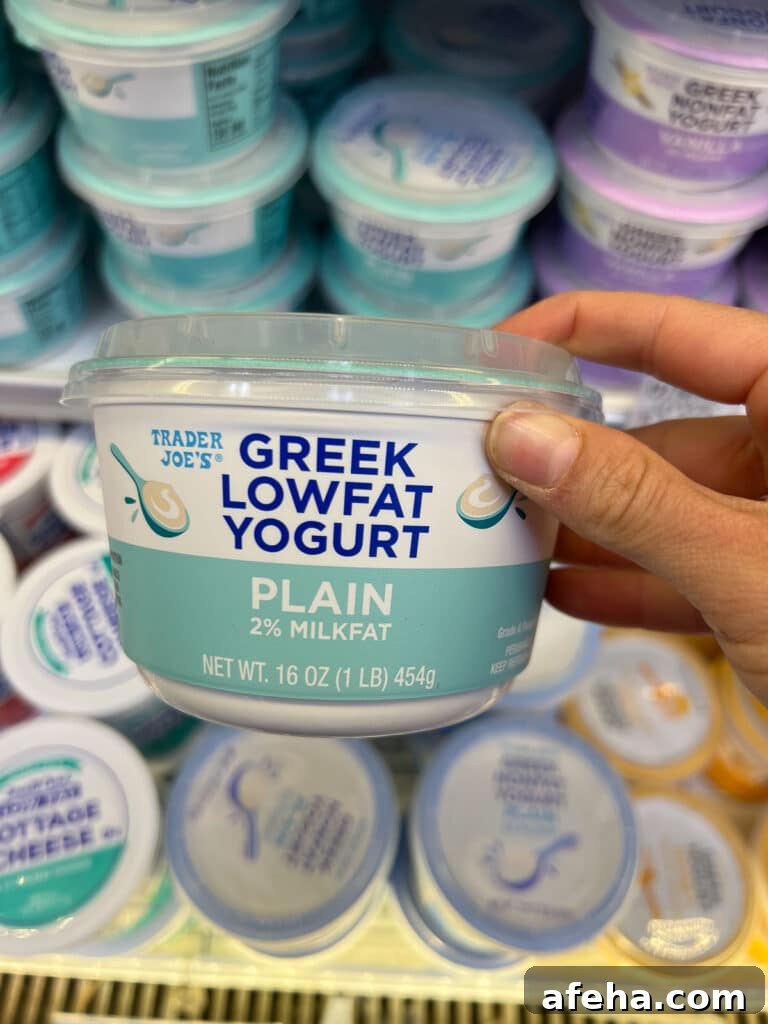 Container of plain Greek lowfat yogurt