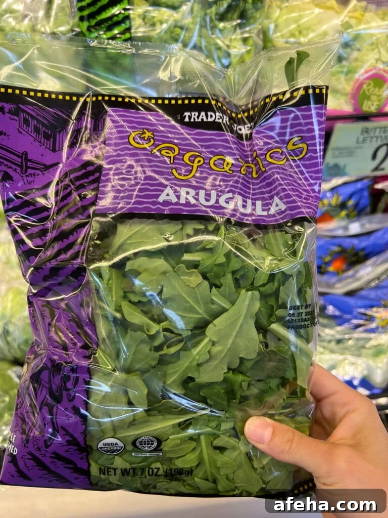 Bag of arugula in a produce aisle