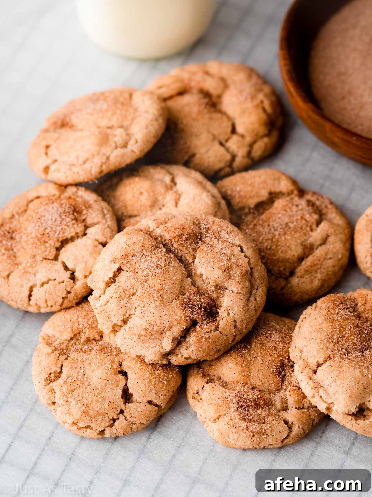Gluten free snickerdoodles on parchment paper. 