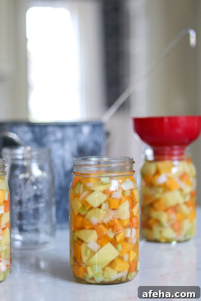 Filling Jars with Butternut Squash Soup Base