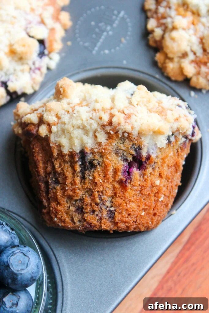 Bakery-Style Sour Cream Blueberry Muffins Recipe 5 Muffin cross-section