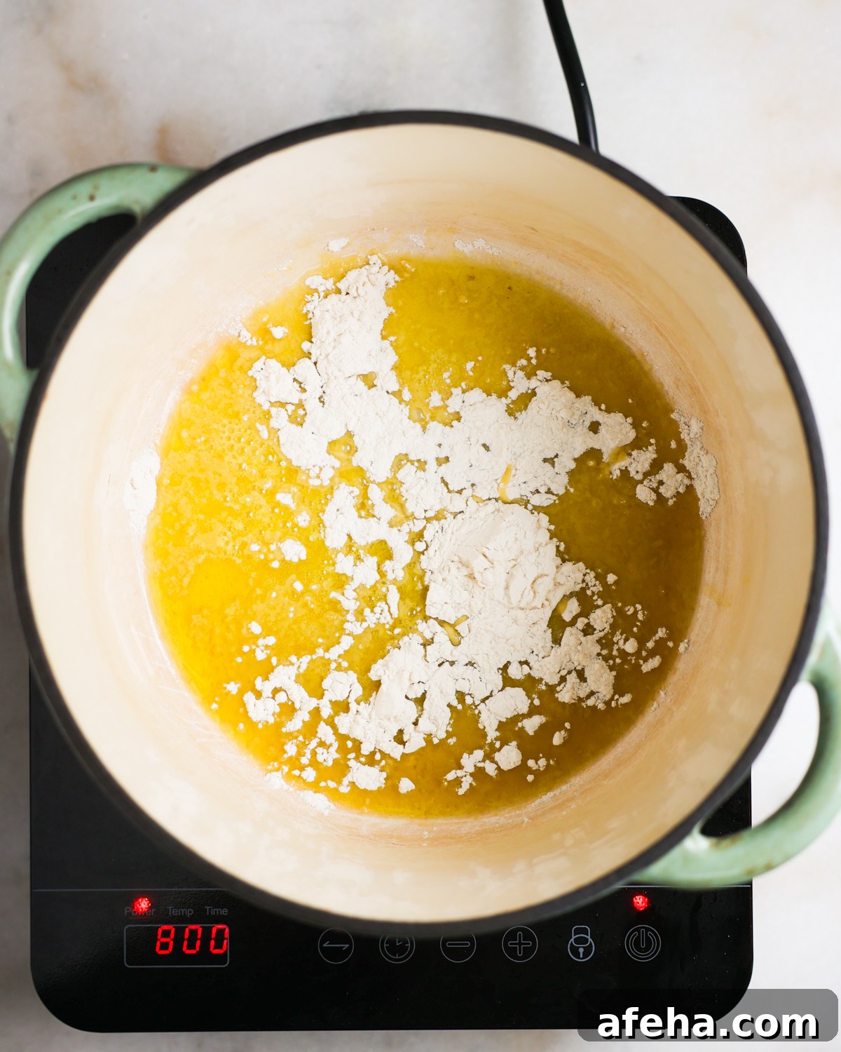 overhead oil and flour in pot