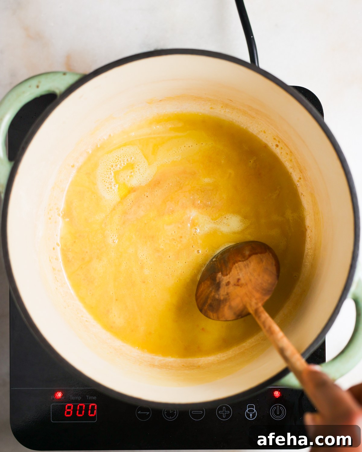 stirring roux in pot