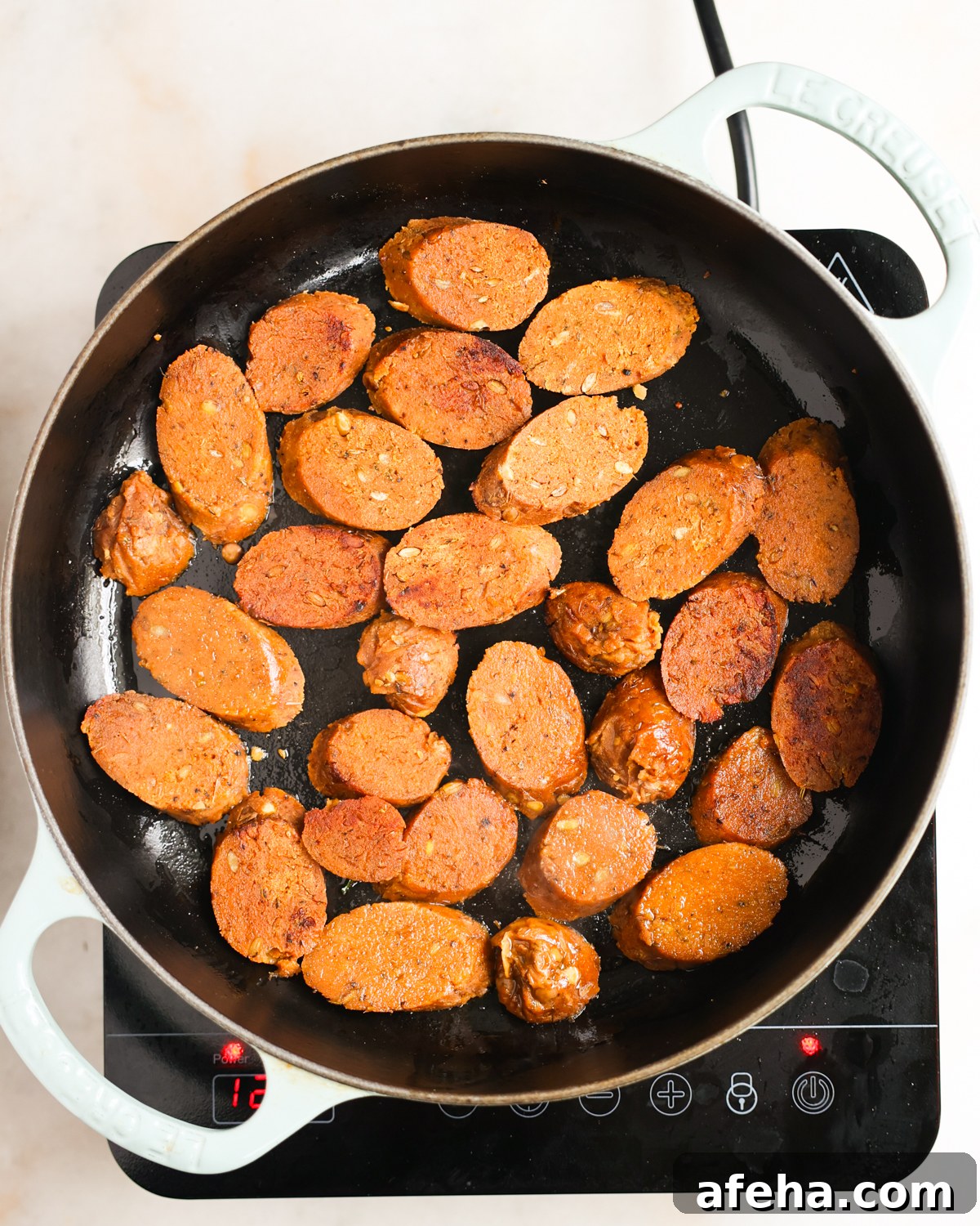 pan frying vegan sausages