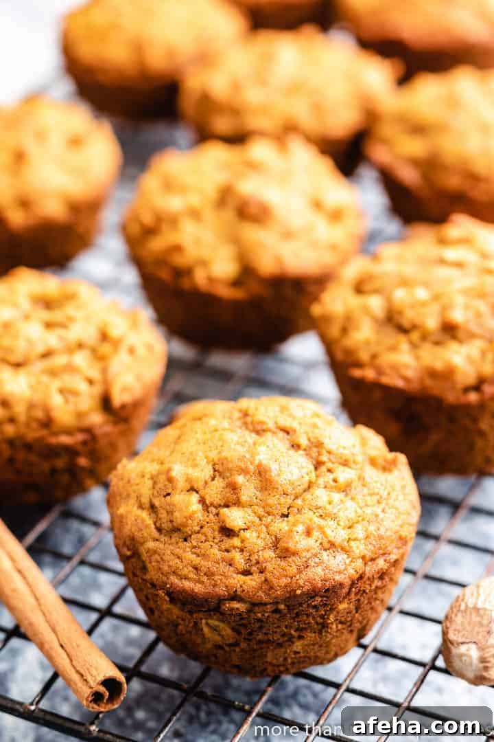 The finished pumpkin muffins on a cooling rack.
