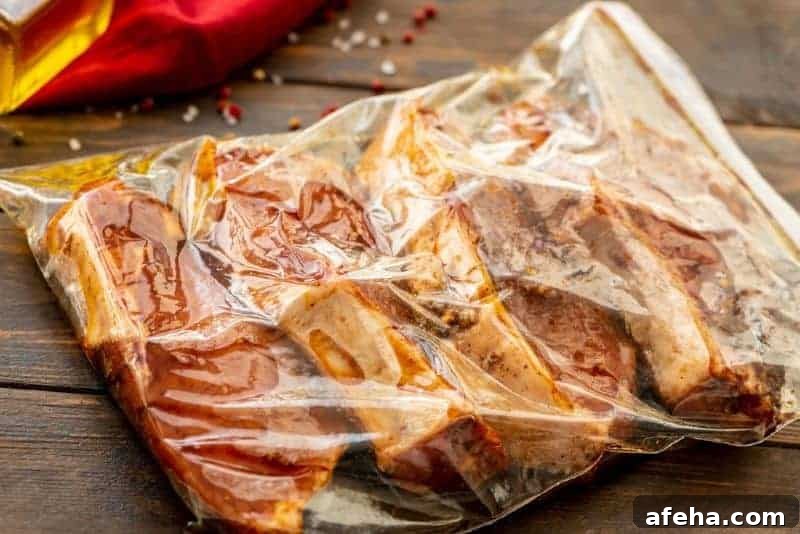 Savory Pork Chop Marinade for Juicy Grilled Pork Chops 3 Pork chops in marinade