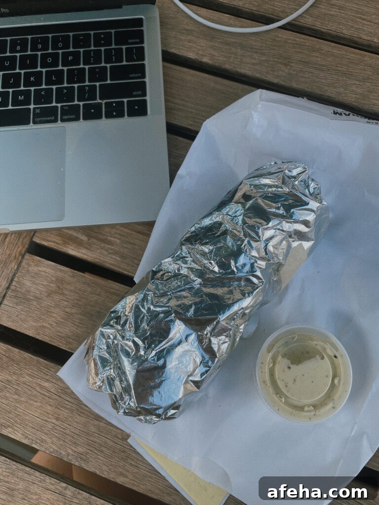Skiers' Breakfast Burrito from Beaumont Bakery: A Mountain Favorite 2 breakfast burrito in tinfoil