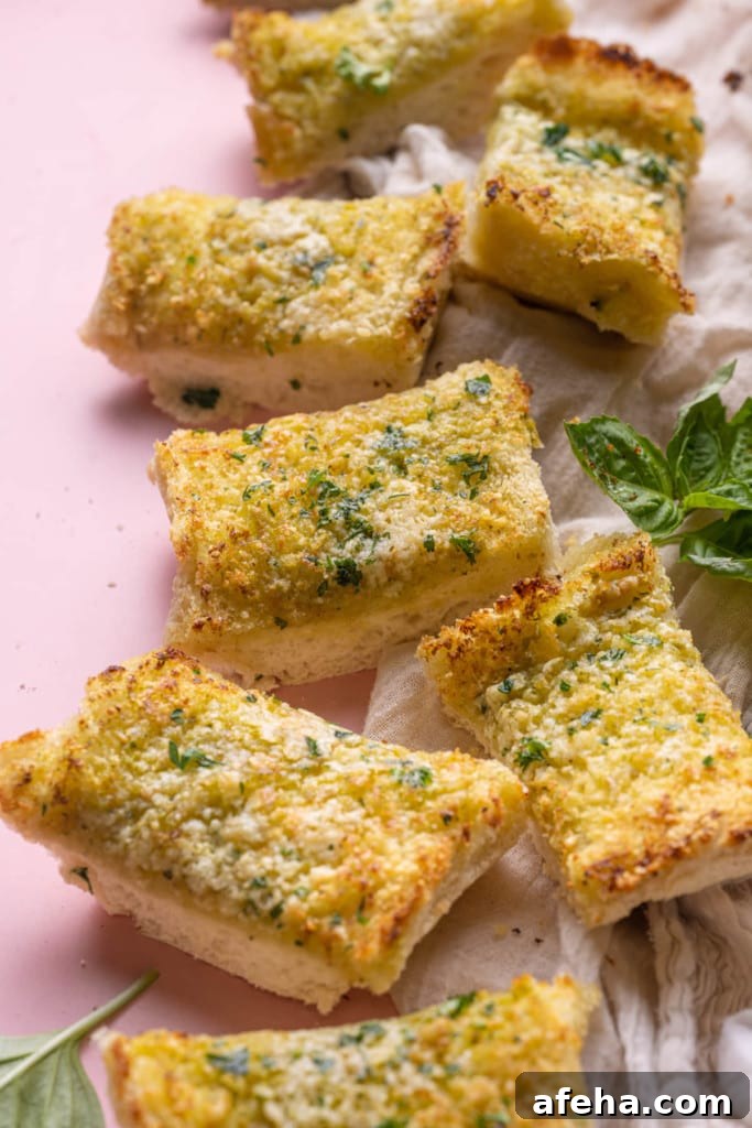Close up of Pesto Butter Garlic Bread