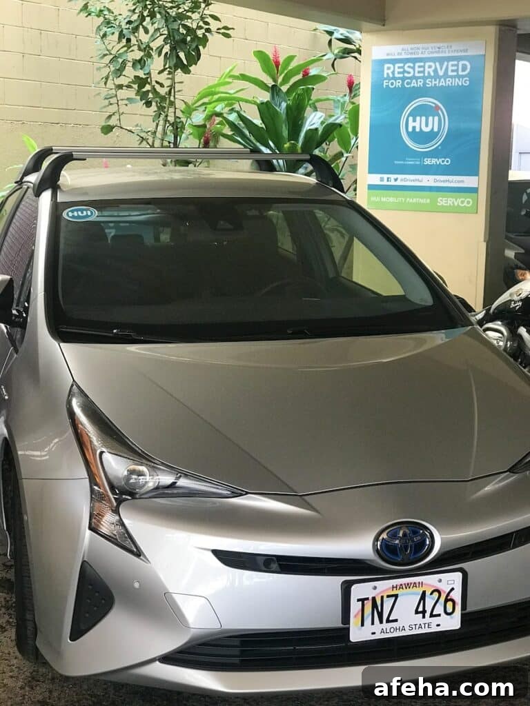 A Hui car rental station in a Waikīkī car parking lot.
